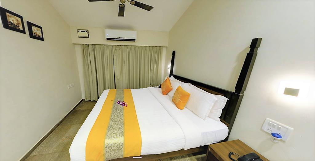 Resort De Crossroads Calangute Chambre photo